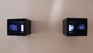 Instalasi hologram dari berbagai gorga (ornamen khas) Batak.