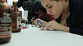 Coco serius mengerjakan soldering.png